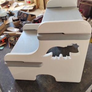 alzador con dinosaurio