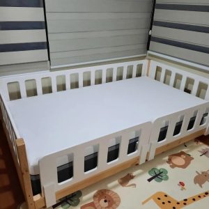 cama corral con doble baranda móvil
