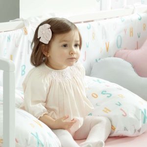 Funda protector cuna Abecedario reversible mostaza