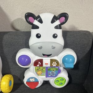 Andadora de vaca, Fisher-Price