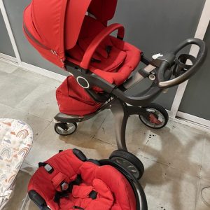 Carriola con bambineto, Stokke