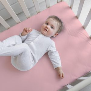 Sábana bajera cuna rosa