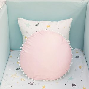 Cojín con borlas rosa